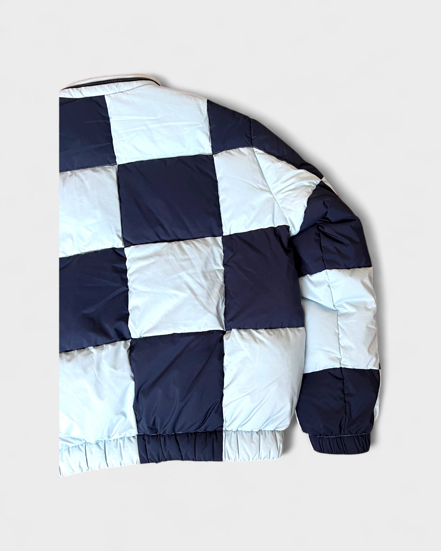 Daunenjacke mit Schachbrettmuster – Navy / Hellblau