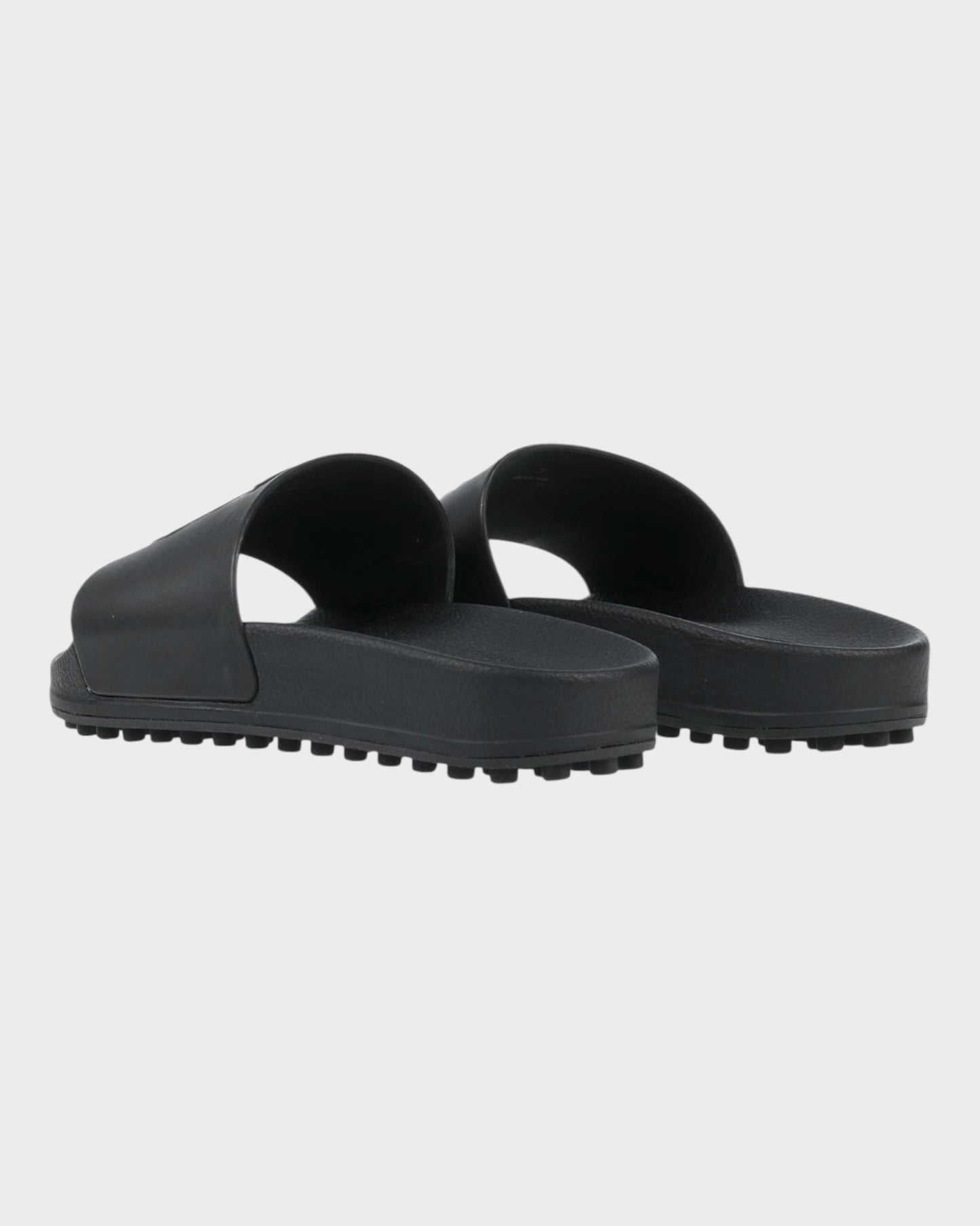 Slides mit ikonischem Tod’s Monogramm