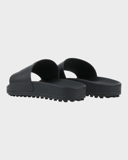 Slides mit ikonischem Tod’s Monogramm