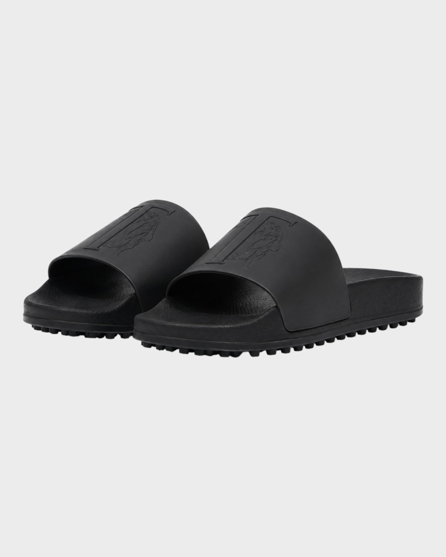 Slides mit ikonischem Tod’s Monogramm