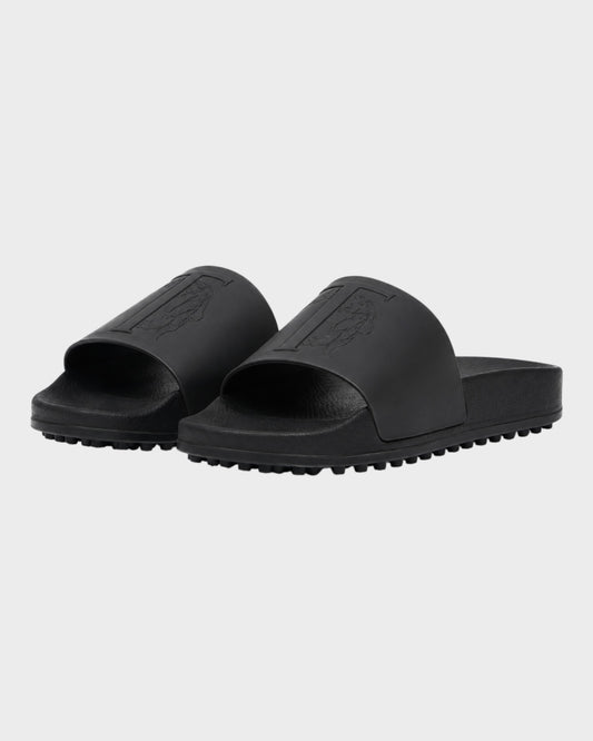 Slides mit ikonischem Tod’s Monogramm
