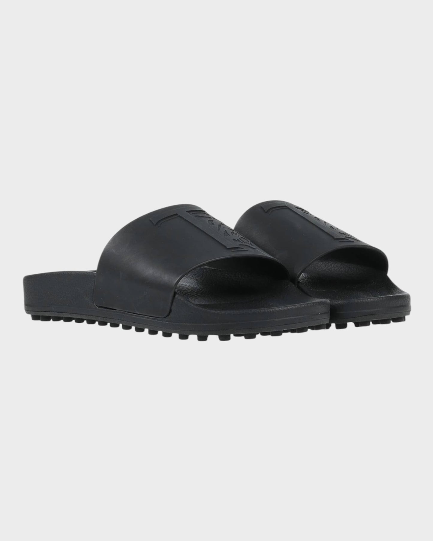 Slides mit ikonischem Tod’s Monogramm